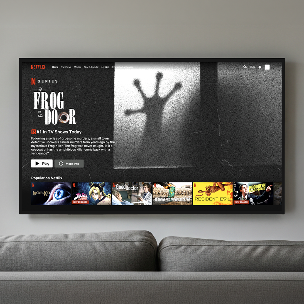 photo of a poster depicting a young man wearing glasses, surrounded by various objects and animals inside of a vinyl record, against a colorful brick background